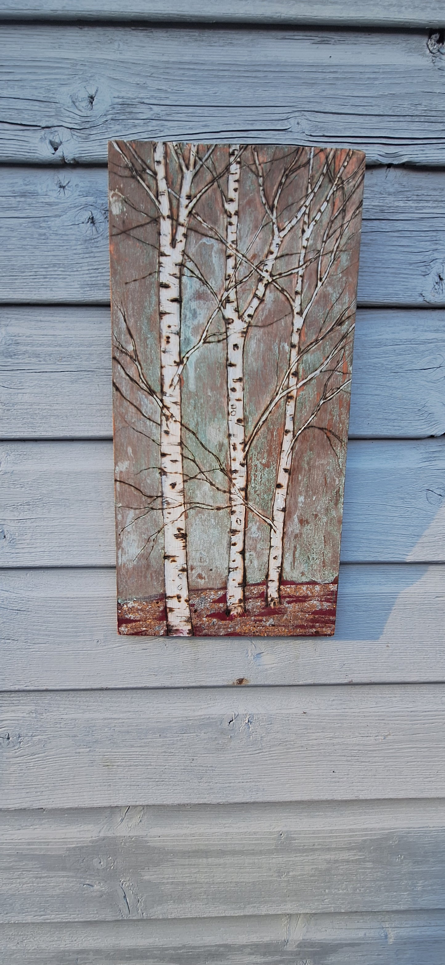 Copper birch trees with a touch of red and gold