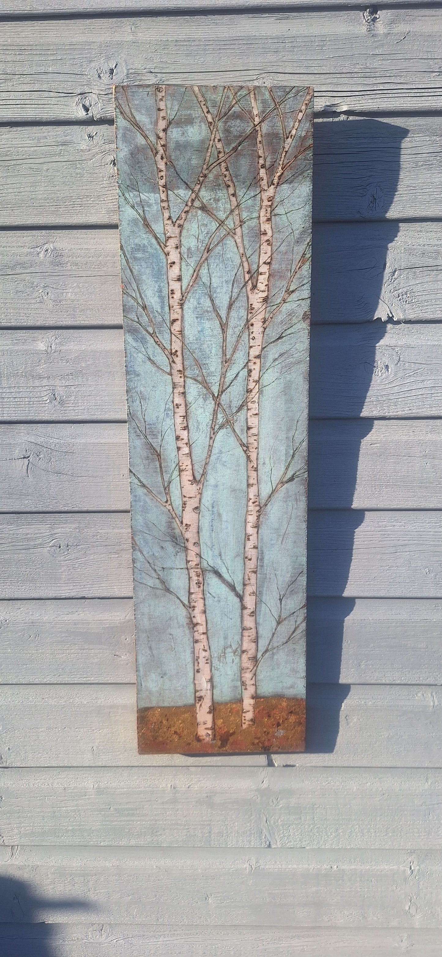 A pair of Silver Birch Copper verdigris with a touch of gold