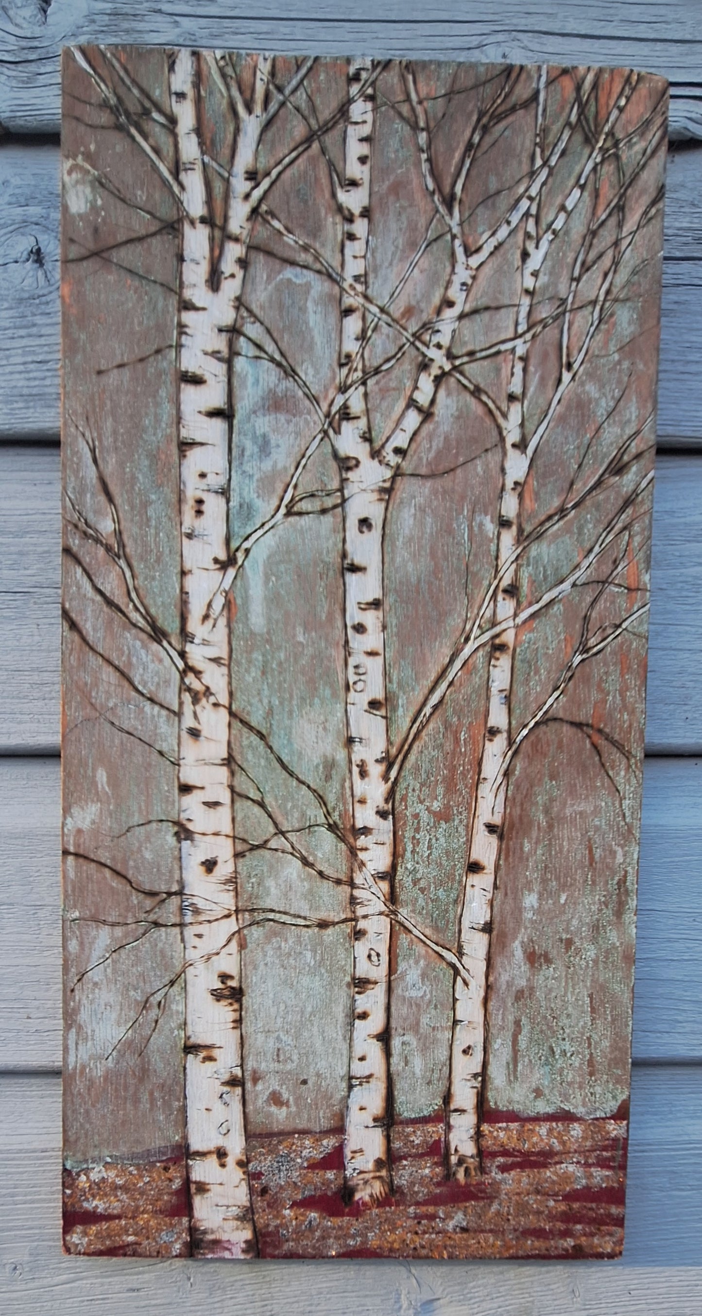 Copper birch trees with a touch of red and gold